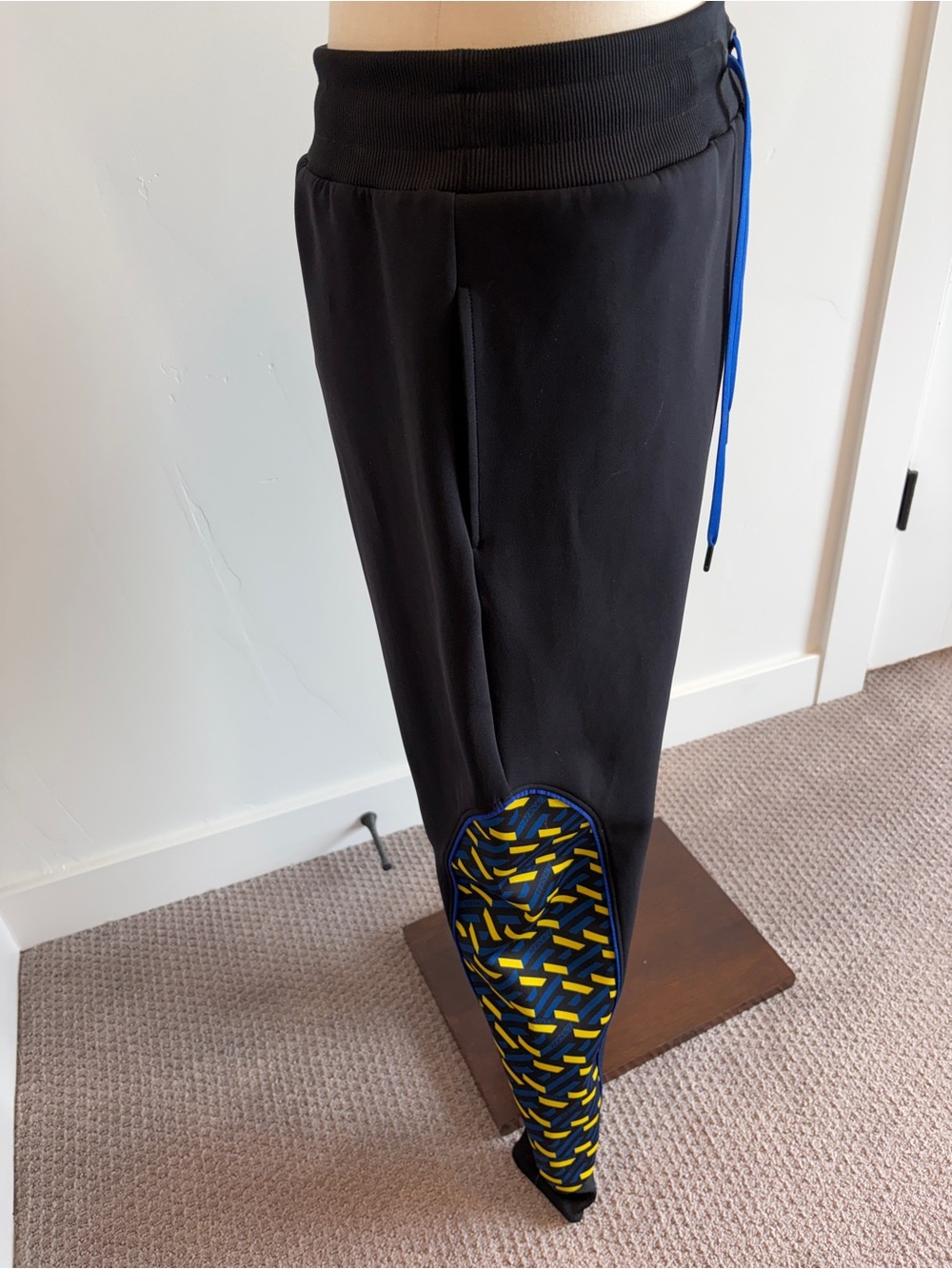 Versace Black Track Pants with Blue and Yellow Accents - Picture 2 of 5